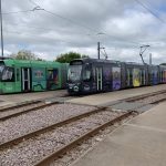 the-two-trams-the-green-one-with-the-original-a-z-of-consent-and-the-grey-one-with-the-night-time-a-z